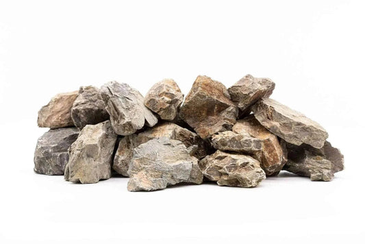 A pile of Manten Stones showcasing their natural textures and irregular shapes, ideal for creating elegant and versatile aquascape formations.